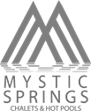 Mystic Springs Chalets and Hot Pools logo with overlapping mountain lines forming an M above stylized water waves