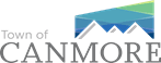 Logo of the Town of Canmore featuring stylized mountains in shades of blue and green, with bold "CANMORE" text below. Conveys a sense of nature and modernity