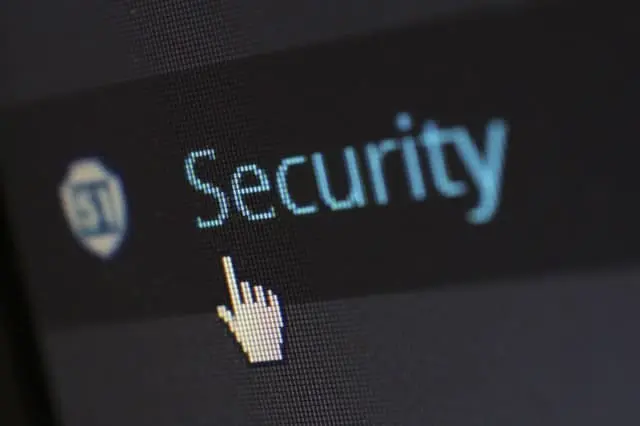 A cursor clicks on 'Security,' representing the peace of mind provided by our Canmore property management.
