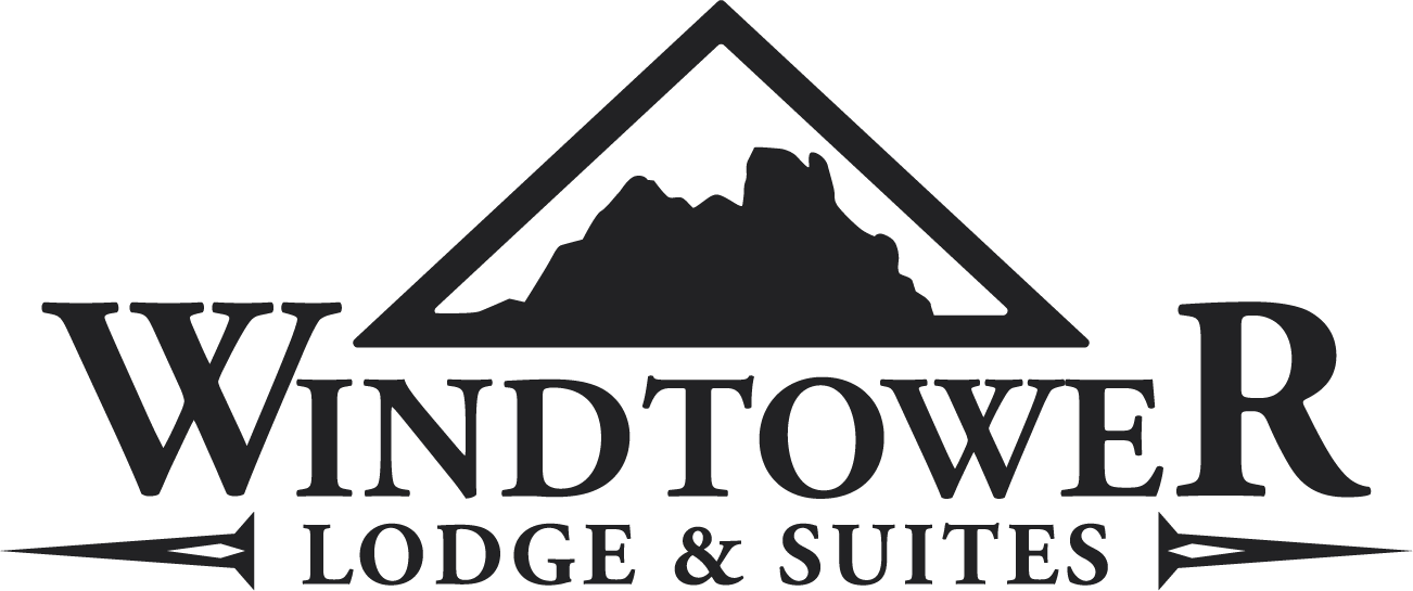 Windtower Lodge and Suites logo with mountain silhouette inside triangle and stylized black lettering