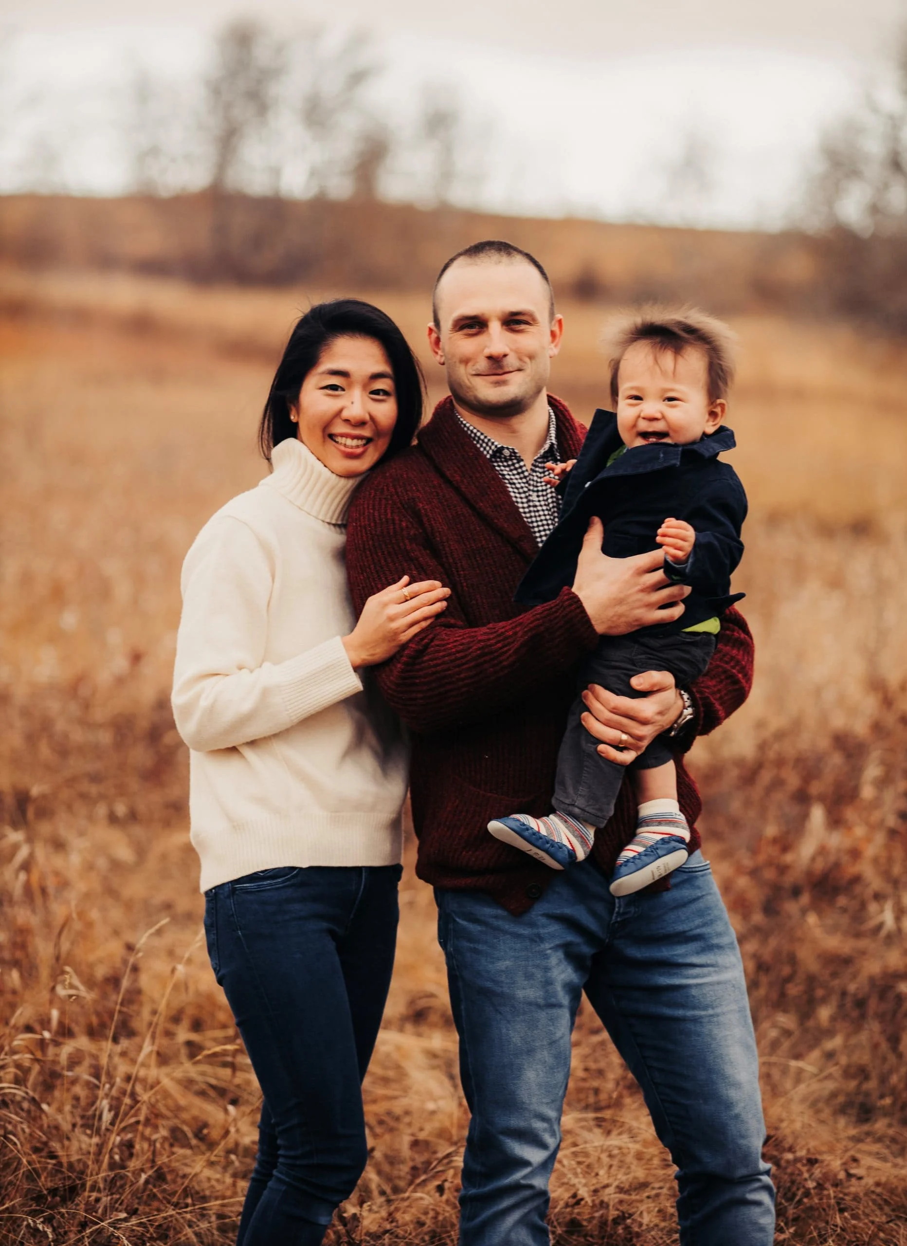 A portrait of Charlie and Yuki, the family team behind Canmore Co-host, your experts in Airbnb management in Canmore.